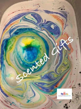 Load image into Gallery viewer, Unicorn jead shaped bath bomb﻿ scented in unicorn sparkles  A fresh, juicy, sugar laden blend of papaya, peach, mandarin, raspberry, grape and pineapple, with sweet hints of coconut and jasmine all rolled up with white musk and amber. A white decorated bomb with coloured embeds.
