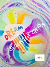 Load image into Gallery viewer, Rainbow Dream Cloud bath bomb  scented in slam bar fragranced (sweet and fruity), hand painted with hidden colour inside.
