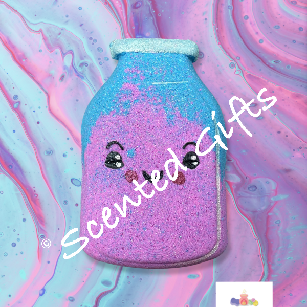 Milkshake shaped bath bomb scented in Snow fairy lush. A milkshake bomb coloured in pink, purple and blue with coloured embeds inside. hand painted design. 