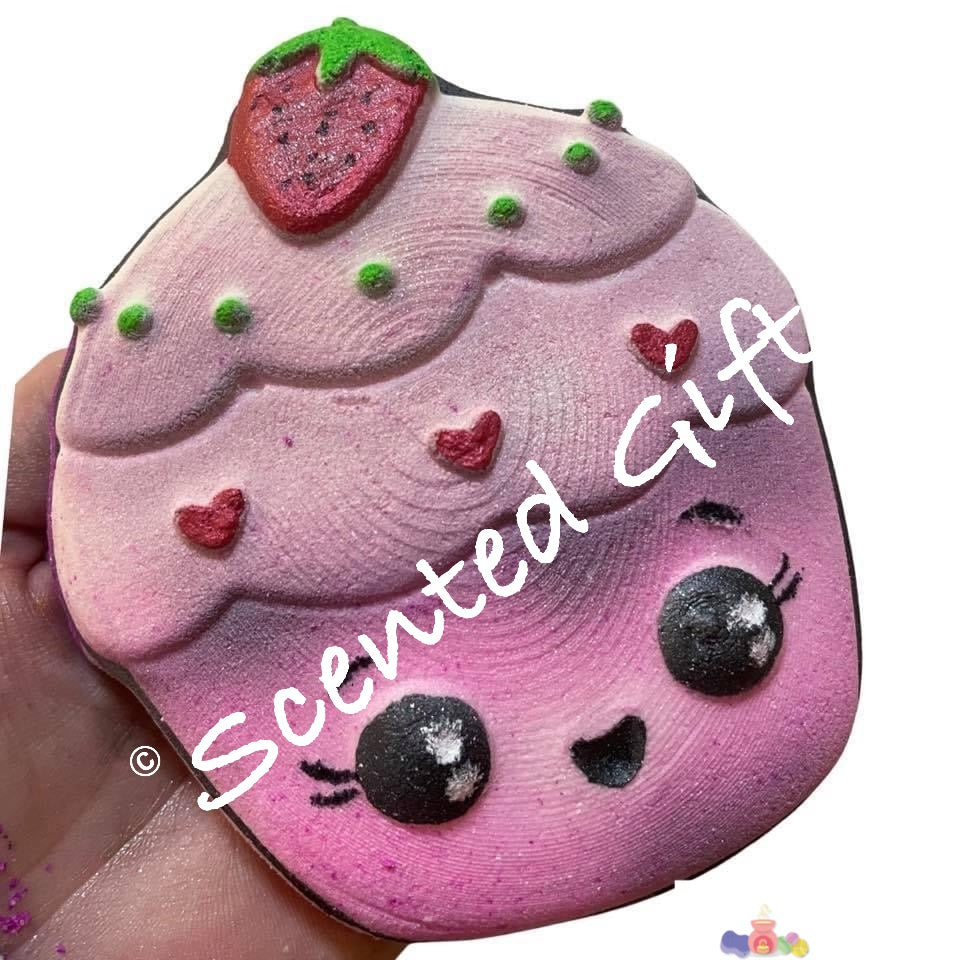 Jumbo Strawberry Bon Bon Cupcake Bath Bomb  jumbo coloured shaped cupcake bath bomb with hand painted design and coloured embeds inside the bomb.