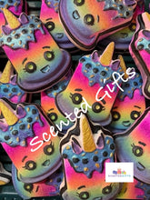 Load image into Gallery viewer, Unicorn Cupcake shaped Bath Bomb A chunky shaped unicorn cupcake bath bomb with hand painted rainbow detail, coloured embeds and scented in fizzy sweets.
