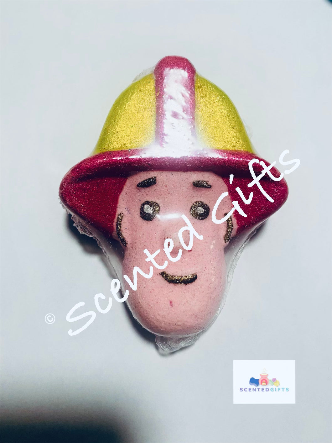 Fire Sam Bath Bomb  A Childress favourite cartoon character fireman same inspired shaped bath bomb with mica hand painted detail and scented in watermelon.  