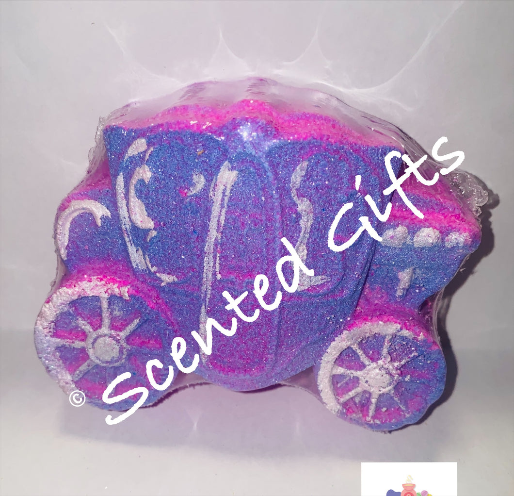 Princess Carriage Bath Bomb  An ombre airbrushed pink and purple carriage shaped bath bomb with silver mica detail and glitter, contains hidden embeds and scented in baby powder.    