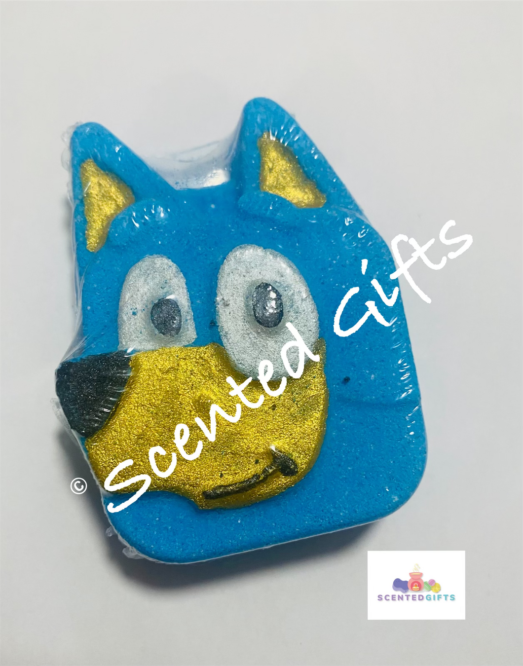 Bluey Bath Bomb  A favourite cartoon character bluey the puppy shaped bath bomb with mica hand painted detail and scented in jellybean 