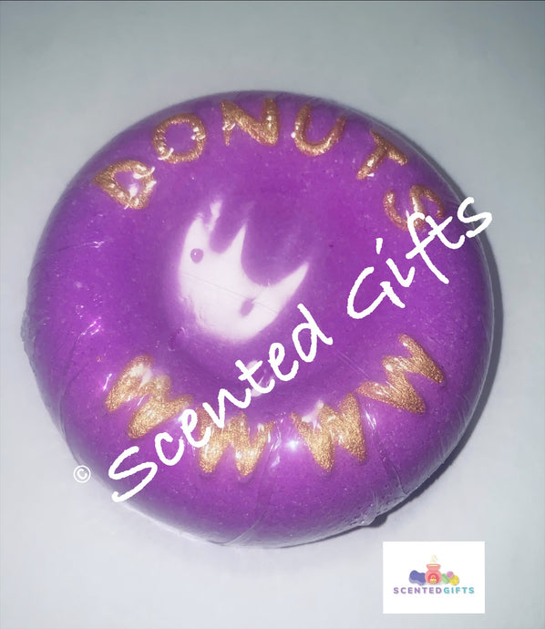 Mmmmm Donut bath bomb  Mmmmm Donut neon pink coloured and donut shaped bath bomb with hand painted mica detail scented in marshmallow. 