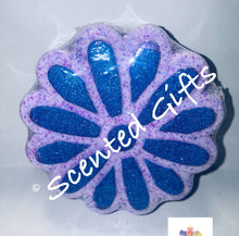 Load image into Gallery viewer, Purple Daisy bath bomb    A purple coloured daisy flower shaped bath bomb with coloured hidden embeds and scented in bedtime bath.  
