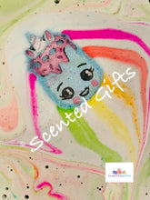 Load image into Gallery viewer, Unicorn Cupcake shaped Bath Bomb A chunky shaped unicorn cupcake bath bomb with hand painted rainbow detail, coloured embeds and scented in fizzy sweets.
