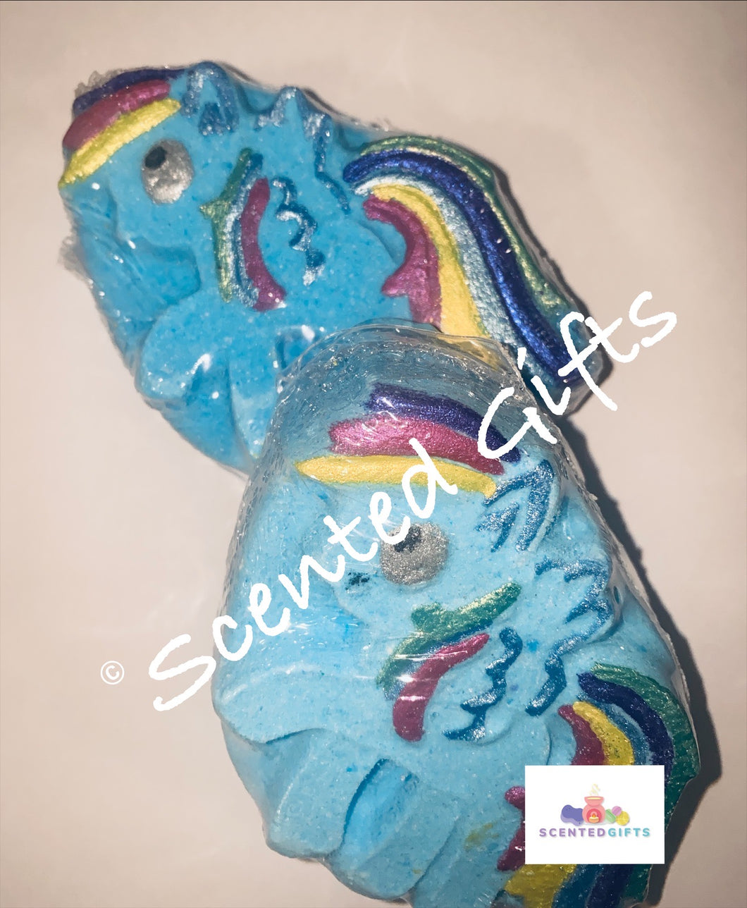 My little pony bath bomb A blue coloured my little pony shaped bath bomb with rainbow painted detail and hidden colours scented in Raspberry Crush